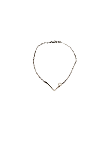 Kickball | sterling silver with a white pearl necklace