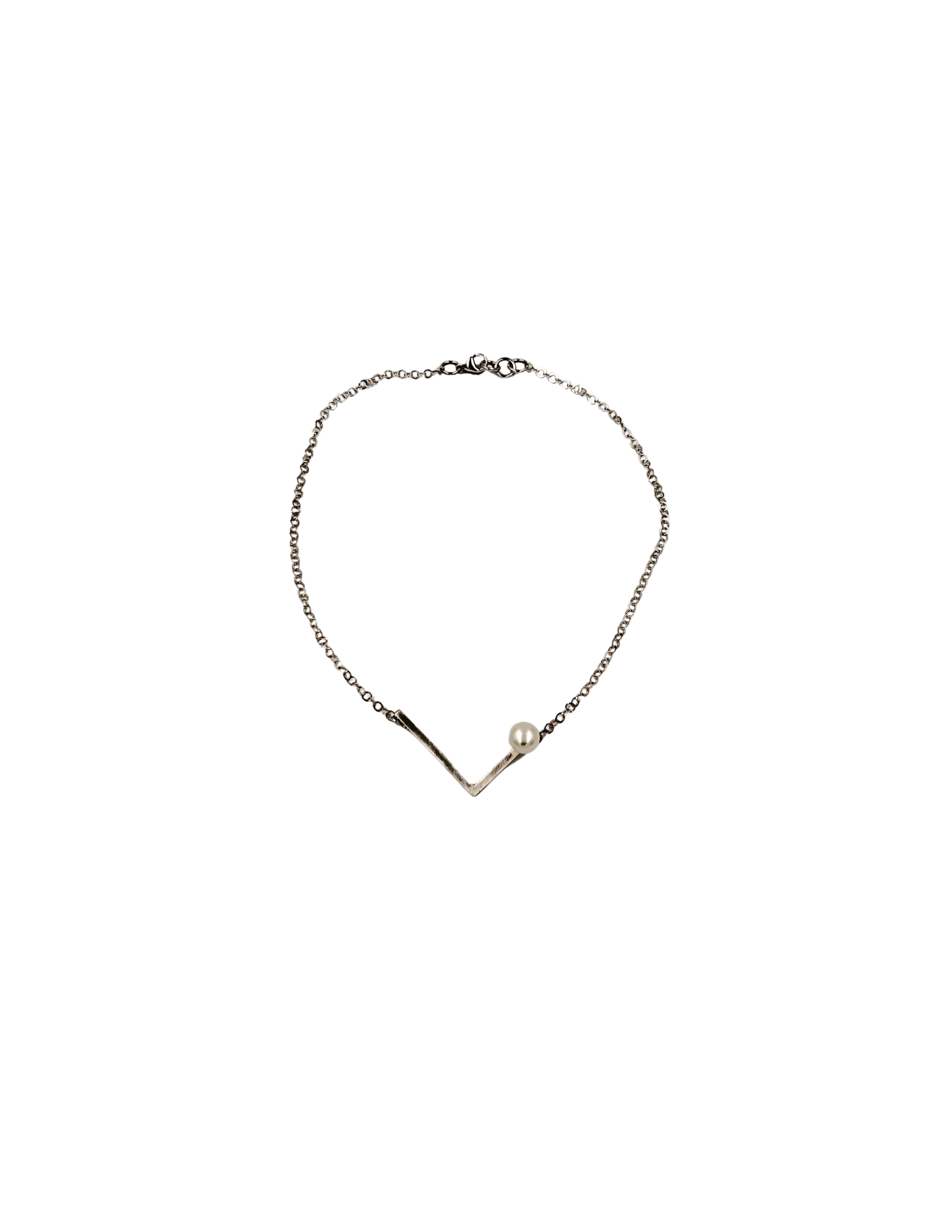 Kickball | sterling silver with a white pearl necklace